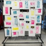 Multi-color print block images on display